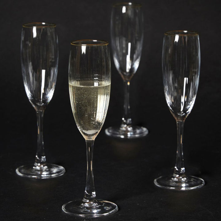 Champagnerglas 19 cl, geriffelt mit Goldrand - 4 Stück.