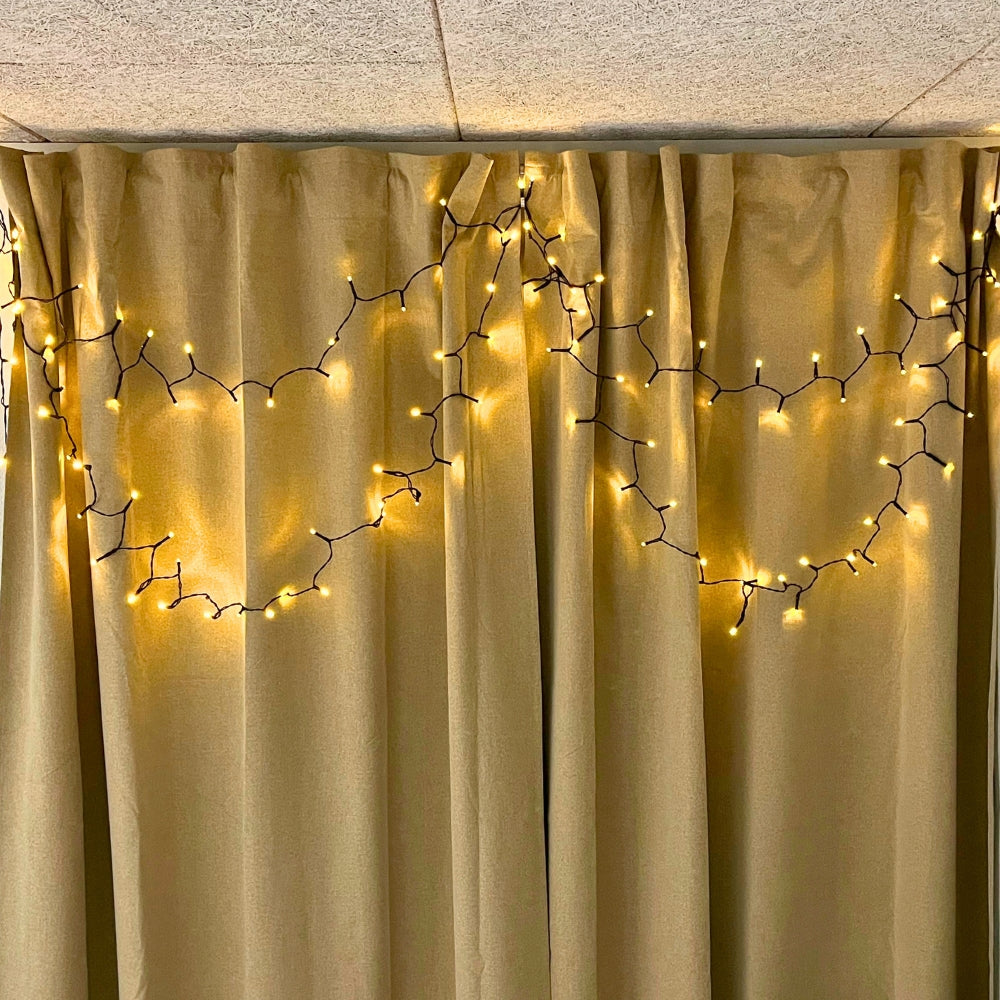 Dacore – Batteriebetriebene Lichterkette mit 120 LEDs, die im Takt der Musik blinkt – Warmweiß
