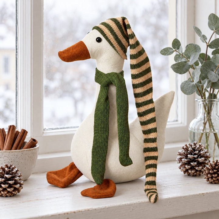 Weihnachtsente mit Mütze liegend 22x11x70 cm sand/grün